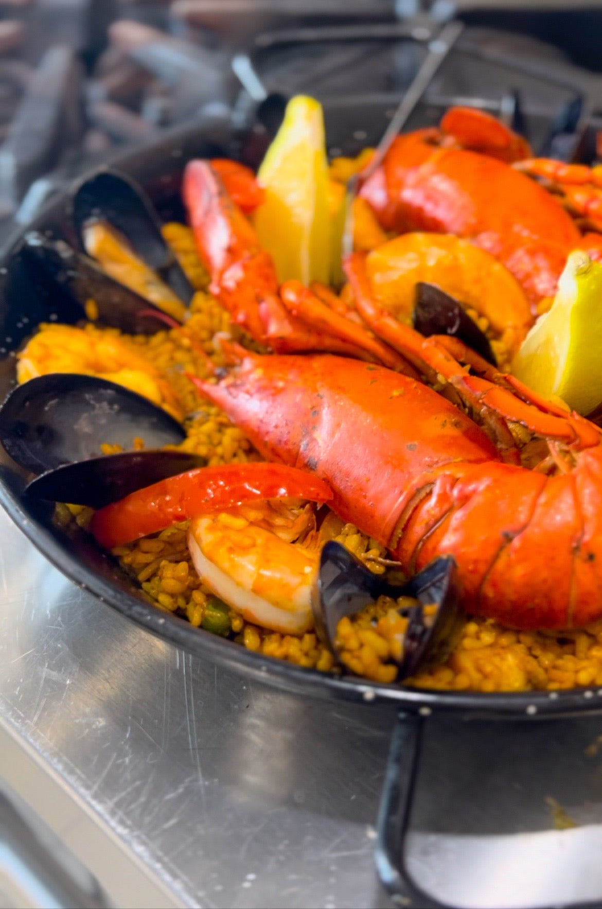 Paella au homard / prix par personne